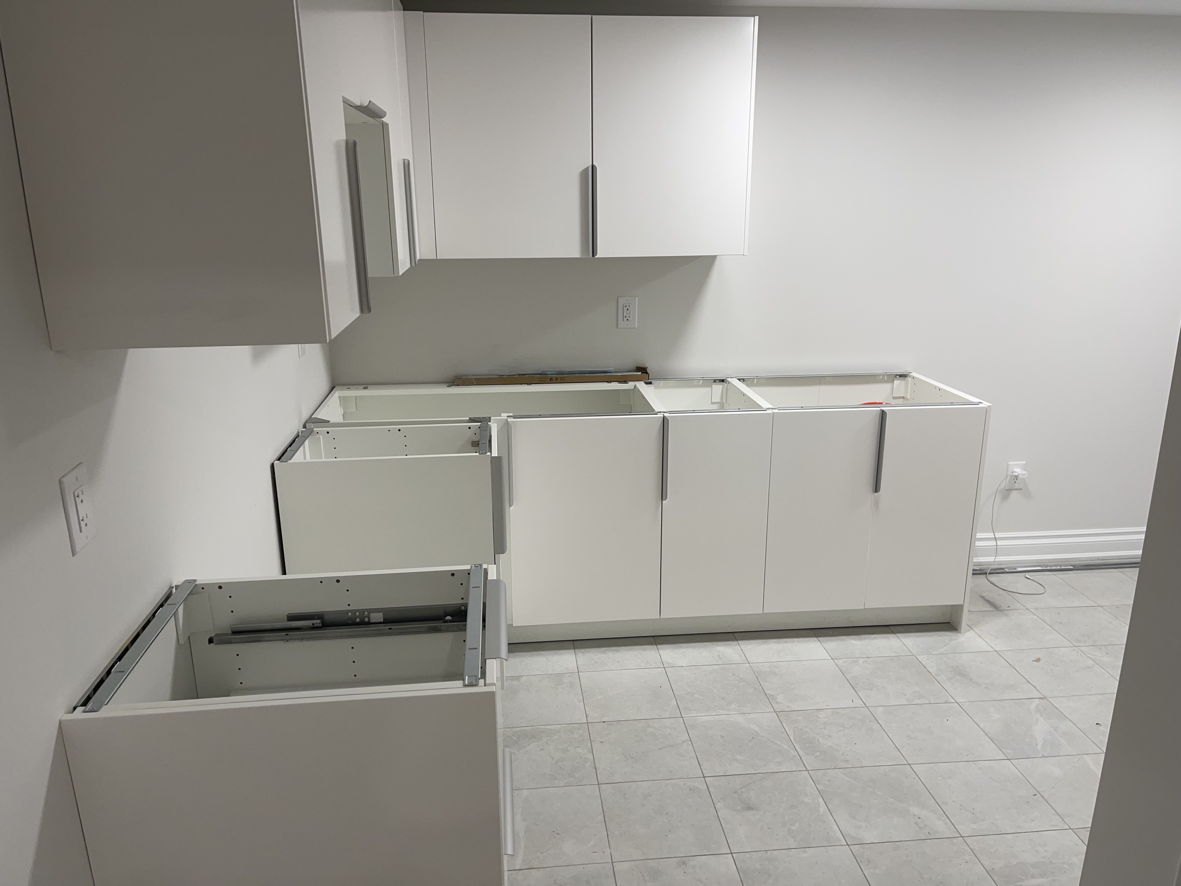 Ikea kitchen cabinet built by handyman