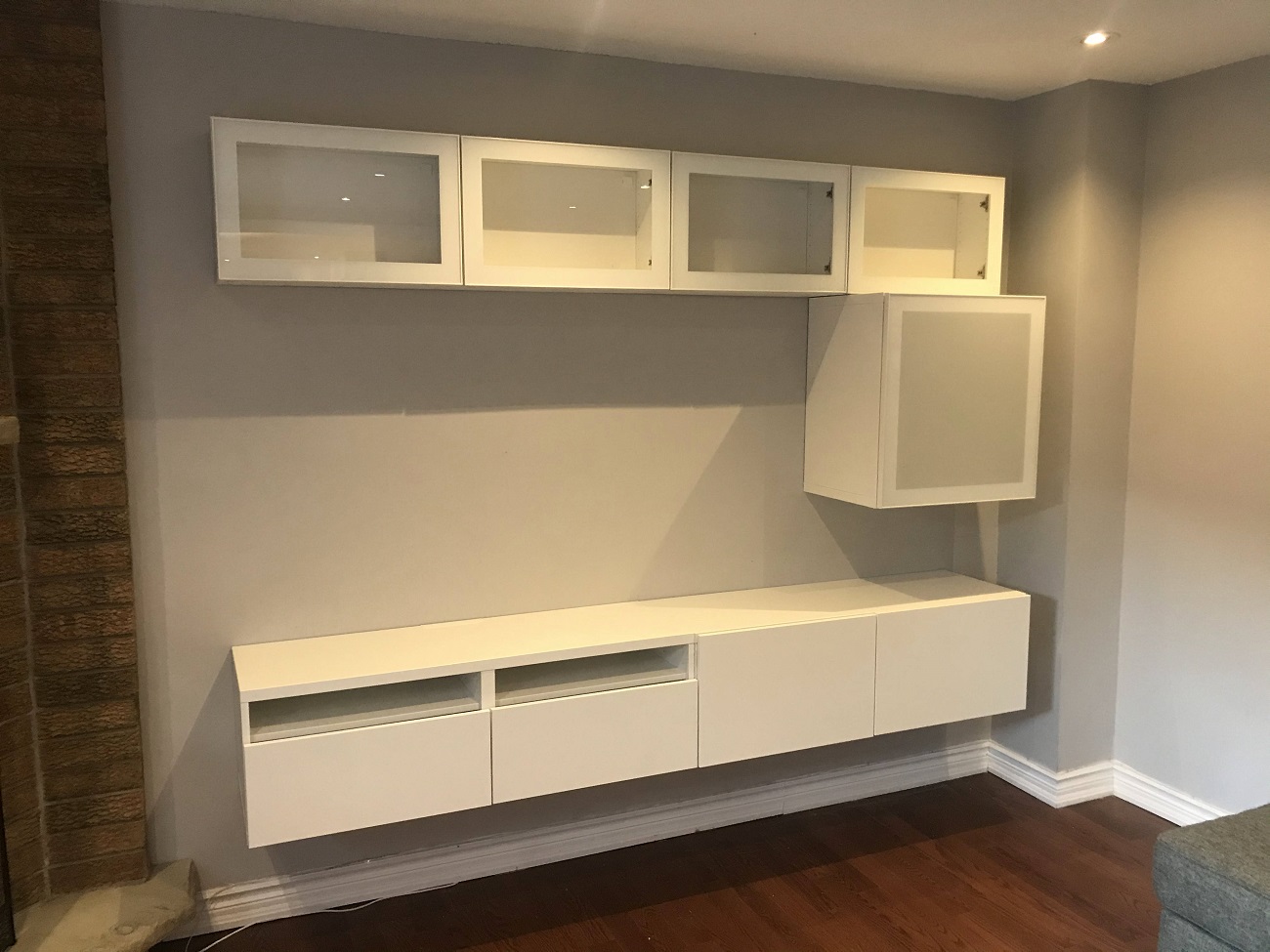 Ikea besta tv benches mounted on the wall by our handyman